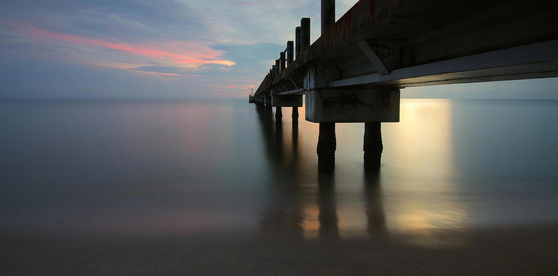 Header Background: jetty at sunrise